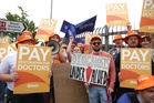 Junior doctors vote to accept pay deal and end years of strikes