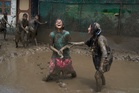 Photo show Paddy Day, the festival marking the start of the rice planting season in Nepal