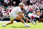 Jannik Sinner bloodied during fierce five-set victory in Wimbledon opener