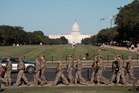 DC protester who played Star Wars music at National Guard settles case against the government