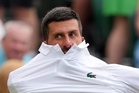 A marriage proposal and Bad Bunny steal attention from Novak Djokovic's opening Wimbledon match