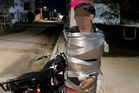 Mexican ‘batman’ vigilante wanted for chasing down suspected thieves and taping them to lampposts