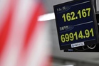 Asian shares mostly higher tracking Wall Street gains and oil stabilizes