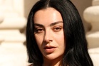 Charli XCX says playing up her mixed-race heritage ‘does not come naturally’
