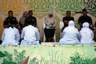 Couple caned for kissing on TikTok in Indonesia's conservative Aceh province