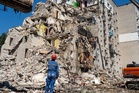 ‘We will rebuild’: Ukrainians defiant after Russia ‘unleashes hell’ on Kyiv, with deadly strikes killing 21