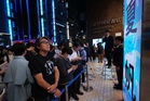 Fans mark the release of new Haruki Murakami novel at a midnight event in Tokyo