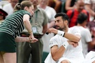 Novak Djokovic plays prank on unsuspecting ball girl at Wimbledon before issuing apology