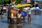 The race to unlock hundreds of billions to pay for life on a hotter planet