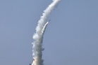 North Korean leader Kim observes weapons tests from new naval destroyer