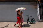 At least 19 suspected heatwave deaths in New Jersey as storms hit