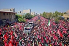 Huge crowds line streets of Tehran for Khamenei funeral procession as mourners chant for revenge