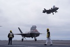 F-35 jets intercepted Russian plane following UK carrier strike group, MoD says