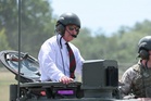 Heavy metal: King rides British Army tank in visit to regiment