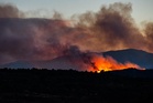 French wildfire forces 10,000 from homes as fans banned from Tour de France stage