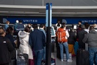 United Airlines extends program that allows passengers to drop luggage off day early