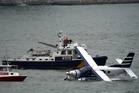 Moment plane carrying 10 crash lands in New York City’s East River