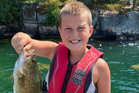 Dad wrestles away alligator to save his 11-year-old son after it bit his hand off during fishing trip