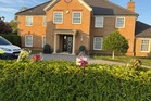 International manhunt as mother and two children found dead in Great Denham home