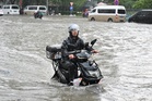 Landslide kills 21 people as storms and heavy rains wreak havoc in China