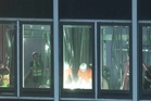 Crews work to reinforce buckled support beams at NYC high-rise