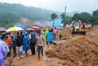 Rescuers search for 5 missing people after a deadly landslide in India's Kerala state