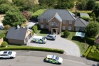 Hunt for man after wife and two daughters found dead at home