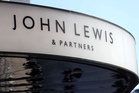 John Lewis puts hundreds of jobs at risk as foreign exchange and gift wrapping counters axed