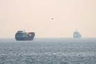 Traffic through Strait of Hormuz halves days after US strikes in blow to global economy