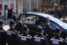 Police form guard of honour at funeral of young officer fatally injured on duty
