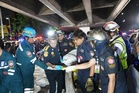 Bangkok pub fire under investigation after 27 people killed early Monday morning