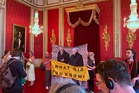 Protesters ask King ‘what did you know?’ about Andrew and Epstein