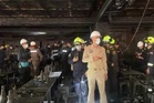 Bangkok emergency services scour through charred pub following deadly fire