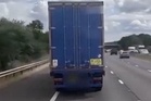 Lorry driver asleep at wheel swerves across busy motorway