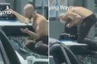 Man filmed jumping onto Waymo taxi and tearing sensor from its roof in Los Angeles