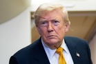 Trump shares post from far-right pundit calling for deportation of ‘hardcore communist b*******’