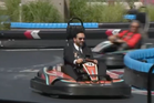 Zohran Mamdani races go-karts in his ever-present suit at Coney Island
