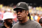 Jay-Z show delayed for hours after fans without tickets rush entrances