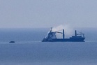 Ukraine-Russia war latest: Putin strikes civilian ship near Black Sea port after threatening ‘powerful’ attacks