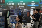 South Korea's central bank hikes rate for 1st time since 2023 to curb inflation, debt