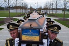 Ukraine buries its unknown soldiers with just a number and a cross