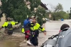 Texas rescuers save child wearing snorkel as heavy floodwaters trigger evacuations