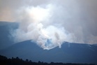 Firefighters spend third day tackling wildfire which has led to evacuations
