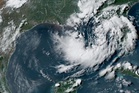 Tropical Storm Fausto forms off Mexico's Pacific as tropical depression swirls in Gulf of Mexico