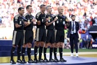 Watch as referee stands on tiptoes for World Cup group photo