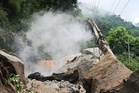 Race to reach trapped workers after 10 killed in tunnel collapse caused by methane explosion in India