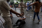 Indian police criticised for brutal crackdown on ‘cockroach’ protests as leader rules out further marches