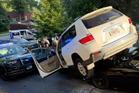 Wild moment suspect’s vehicle ends up on top of police car during chase
