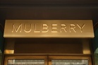 Handbag maker Mulberry cuts losses amid turnaround progress