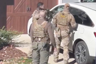 Women arrested by immigration agents for honking their horn sue government for $2.5m